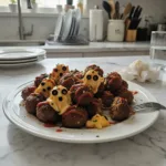 Spooky Cheesy Meatballs: Halloween Dinner Fun! 6 tasty spooky cheese meatballs featured