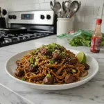 sticky beef noodles featured