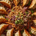the ultimate potsticker noodle bowl with pork cabbage slaw featured